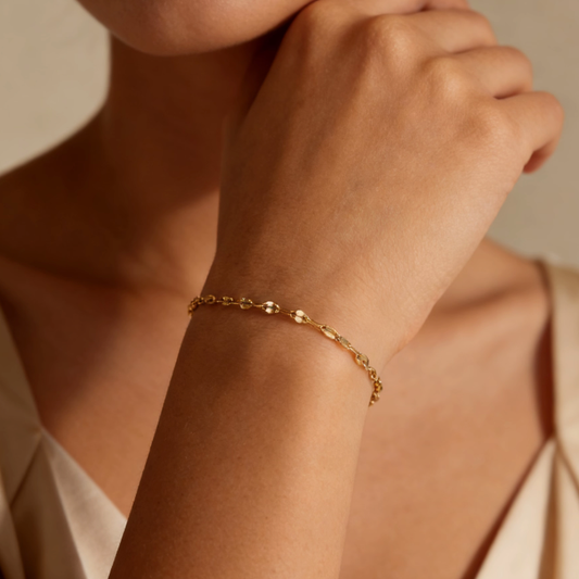 Gold tiny square sequin adjustable bracelet worn on wrist, minimalist dainty sequin link jewelry for women