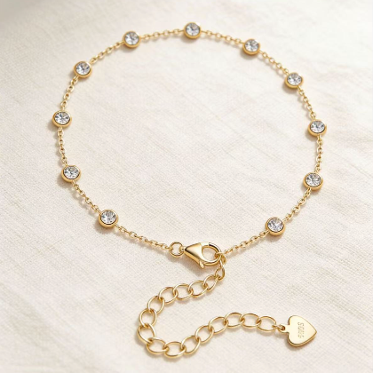 Gold round crystal by-the-yard bracelet with heart charm, minimalist station chain jewelry for women