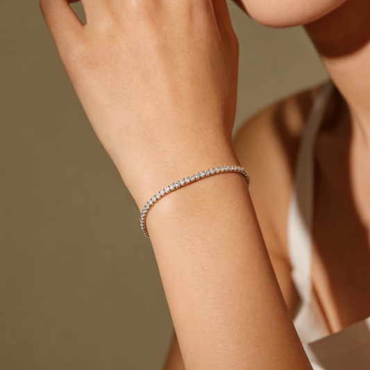 Silver full pavé moissanite tennis bracelet worn on wrist, minimalist full stone jewelry for women